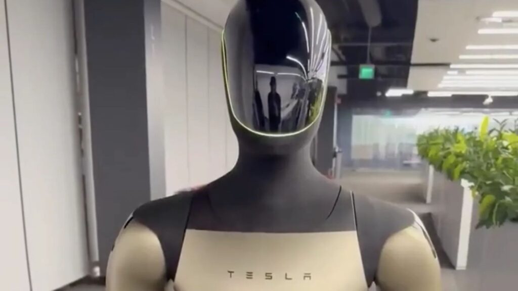 Imagem-10-1-1024x576 Tesla Unveils Golden Optimus 2.5 Robot Prototype