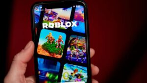 The Roblox app on a smartphone arranged in New York, US, on Tuesday, Nov. 7, 2023. Roblox Corp. released earnings figures on November 8. Photographer: Gabby Jones/Bloomberg via Getty Images | Image Credits:Gabby Jones/Bloomberg / Getty Images