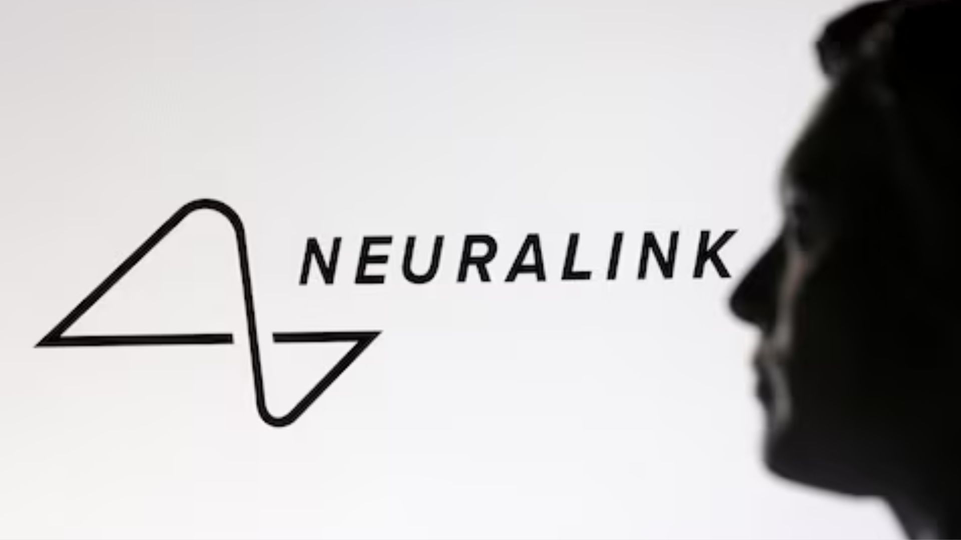 A 3D-printed miniature model of Elon Musk and the Neuralink logo are seen in this illustration taken January 23, 2025. REUTERS/Dado Ruvic/Illustration/File Photo Purchase Licensing Rights