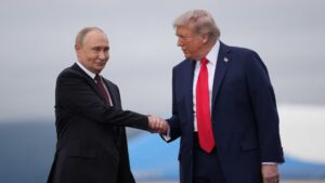President Donald Trump (right) greets Russian President Vladimir Putin as he arrives at Joint Base Elmendorf-Richardson on August 15, 2025 in Anchorage, Alaska. Andrew Harnik/Getty Images
